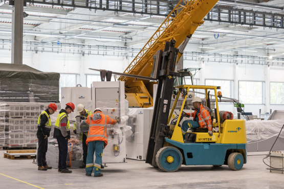 Project manager with installation team